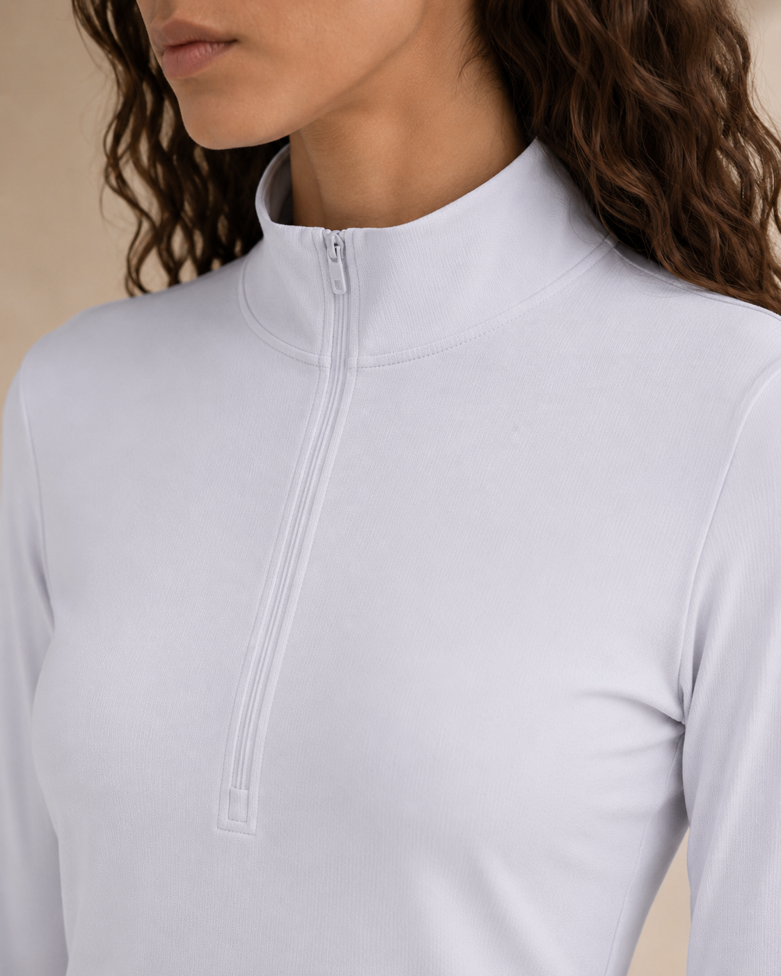 Close-up of the NORTHE Studio Form Jacket in Lilac, showing the half-zip neckline and smooth fabric detail.